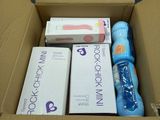 a cardboard box filled with toiletries and a toothbrush