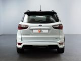 the rear end of a white ford kuga parked in a white room