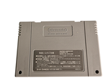an old nintendo game on a white surface