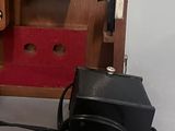 an old fashioned sewing machine sitting on the floor