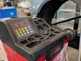 a machine that is sitting on a pallet in a warehouse