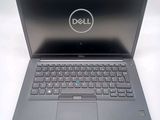 the dell laptop is open and ready to be used
