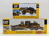 two boxes that have two different models of a cat loader