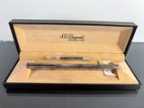 a pen in a box that is sitting on a table