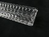 a clear glass box with a pattern on it