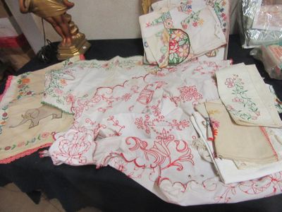 many pieces of cloth that are on a table