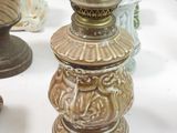 many different vases that are sitting on a table