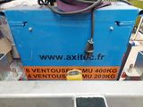 a blue box with a hose on top of it