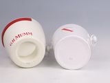 two cups sitting next to each other on a table