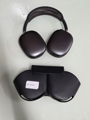 an image of a pair of black headphones and a case
