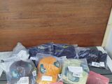 many items that are sitting on the floor in the room