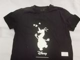 a black shirt with a white image of a cartoon character on it