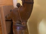 a horse made out of a wooden block on the floor