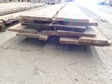 many pieces of wood stacked on top of each other