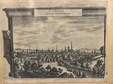 an old picture of a view of a city from the top of a hill