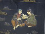 a painting of two people sitting on the ground