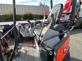 an image of a tractor with a seat on the back of it