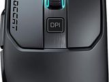 a close up of a mouse on a white surface