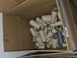 a cardboard box full of toilet paper rolls and other toilet paper rolls