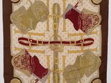 an image of a scarf with a pair of boots on it