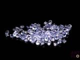 diamonds on a black surface with a black background