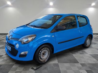 a picture of a blue car parked in a garage