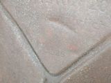 a close up view of a metal object on the ground