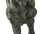 a bronze statue of a bear with its mouth open