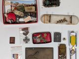 a lot of items that are laying out on the table