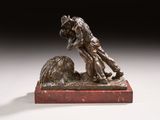 an image of a bronze statue of a man and a dog
