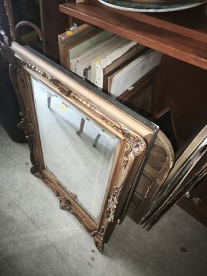 a picture of a picture frame and a bowl on a shelf