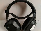 an image of a pair of headphones sitting on top of a table