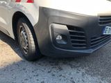 a van that is parked on the side of the road