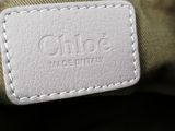 a close up of a bag with a name tag on it