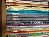 a lot of books in a box on the table