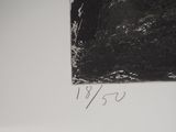 a black and white photo of a painting on the wall