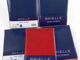 trois boîtes de papier Brielle rouge, bleu et noir