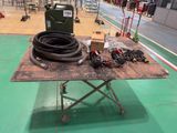 a table that has a bunch of tools on it