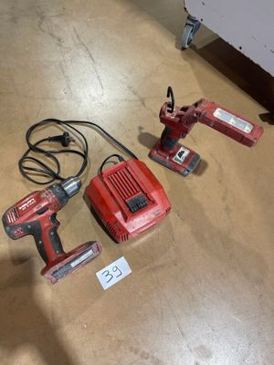 three tools are sitting on the floor in a room