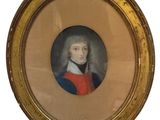 portrait of a gentleman in a red coat in a gold frame