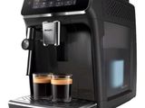 gros plan d'une machine à café sur fond blanc