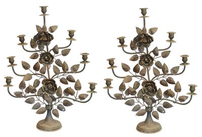 pair of antique iron candelabs with roses and leaves