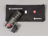 a close up of a flashlight and a pouch on a table