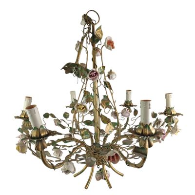 an image of a chandelier with flowers and leaves on it