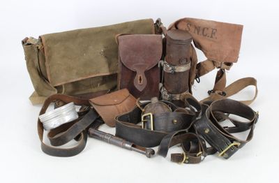 a lot of leather items that are on the table