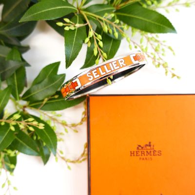 a bracelet that is sitting on top of a box