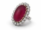 an oval ruby and diamond ring