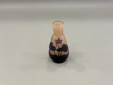a small vase that is sitting on a table
