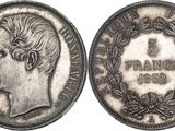 une pièce d'argent portant une tête de femme et des lauriers