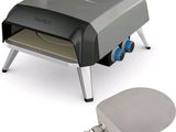 an image of a grill with a spatula on it